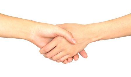 Closeup picture of woman shaking hands isolated on white background.の写真素材