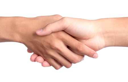 Closeup picture of shaking hands on white backgroundの写真素材