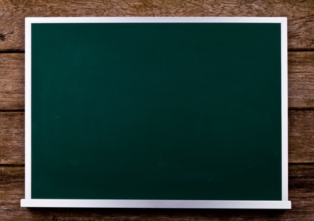 Chalkboard on wooden wallの写真素材