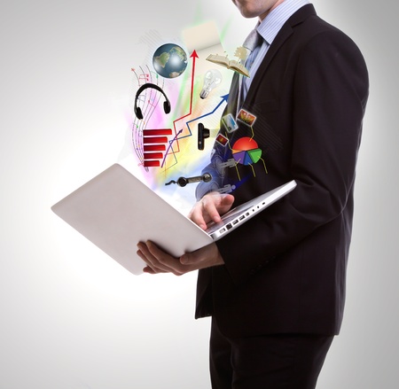 Business man with laptopの写真素材