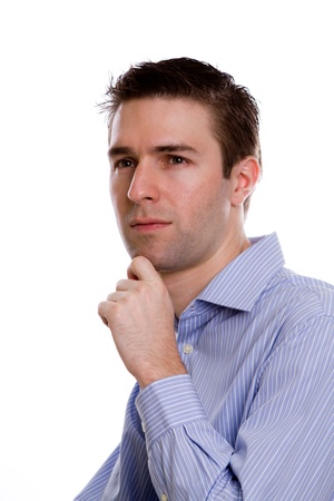 Portrait of handsome young business man against white backgroundの写真素材