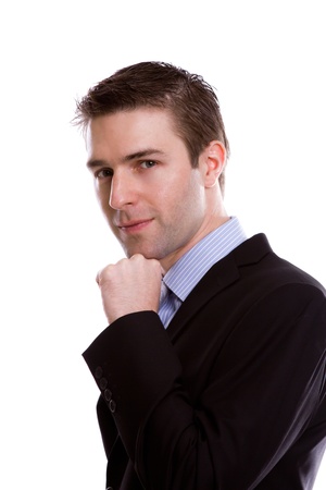 Portrait of handsome young business man against white backgroundの写真素材