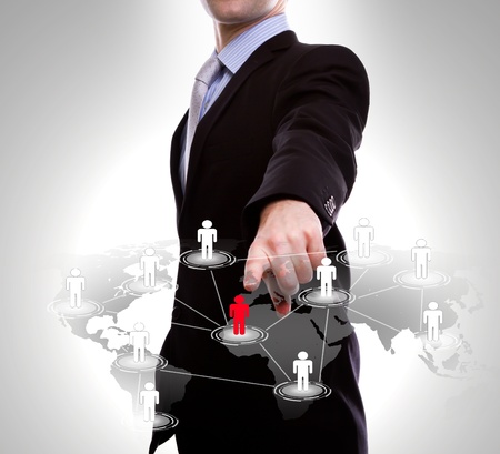 Social Network concept : business man point to social network and world mapの写真素材