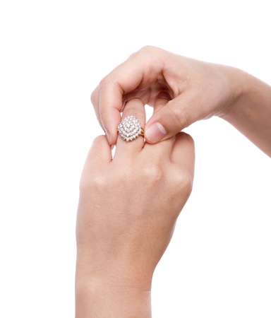 Engagement Ring in hand isolate on white backgroundの写真素材