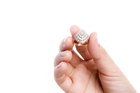 Engagement Ring in hand isolate on white backgroundの写真素材