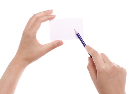 Hand card and pencil  isolated on whiteの写真素材