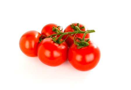Tomatoes over white backgroundの写真素材