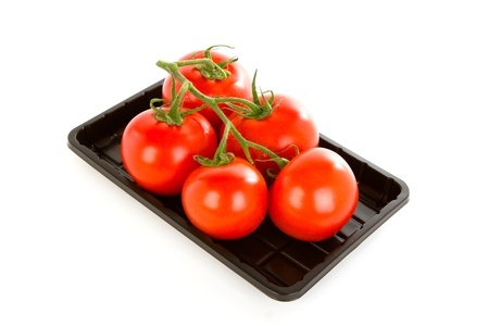 Tomatoes over white backgroundの写真素材