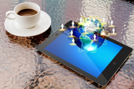 Tablet pc and coffee capの写真素材
