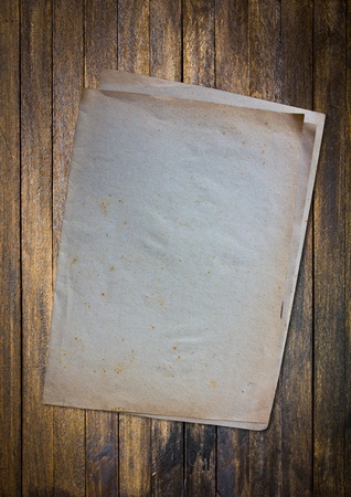 Old paper on the wood backgroundの写真素材