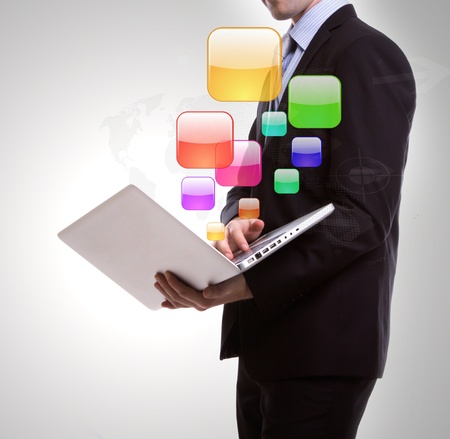 Business man with laptopの写真素材