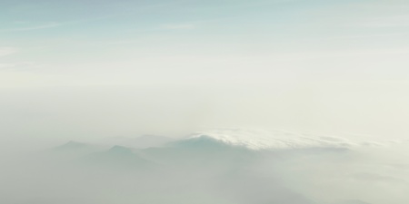 Mountain between cloudsの写真素材