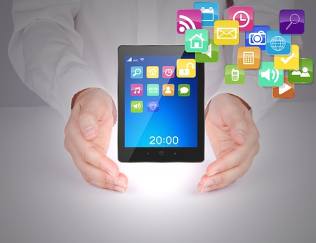 Business man with touch screen deviceの写真素材