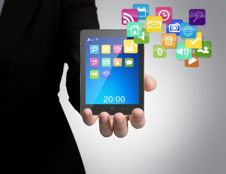 Business man with touch screen deviceの写真素材