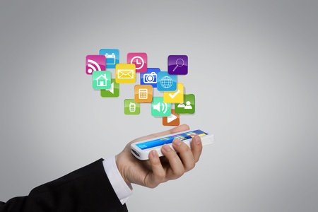 Mobile phone with colorful application iconsの写真素材