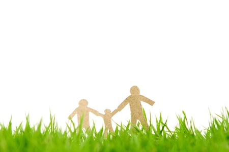 Paper cut of family on fresh spring green grassの写真素材