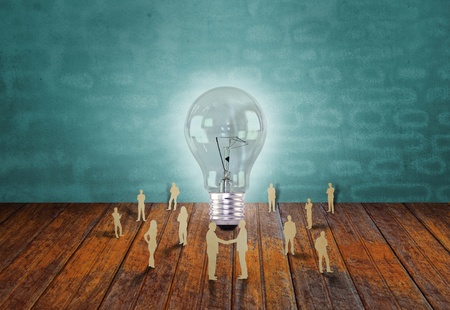 Paper cut of business people and light bulbの写真素材