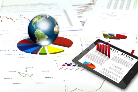 Touch pad and financial Graphs  (Elements of this image furnished by NASA)の写真素材