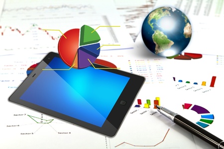 Touch pad and financial Graphs  (Elements of this image furnished by NASA)の写真素材