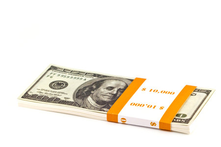 Ten thousand dollar stacks on the white
