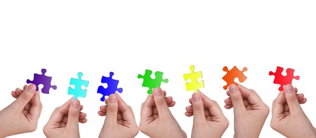 Hands and puzzleの写真素材