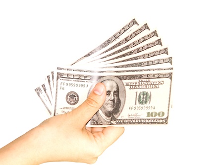 Hands holding dollars isolated on white backgroundの写真素材