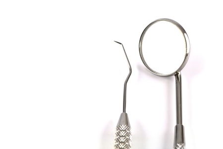 Dental tools and equipment on dental chartの写真素材