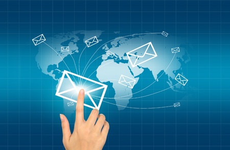 Hands with world mail delivery on world map backgroundの写真素材