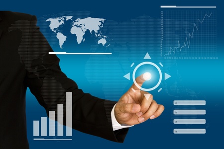 Business hand pushing a button on a touch screen interfaceの写真素材