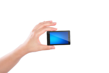 Mobile phone in hand isolated on white background