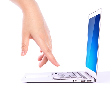 Female hands writing on laptopの写真素材