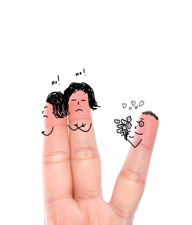Broken heart concept painted on human fingers ( Two women say no  and one  man hold flower  )の写真素材