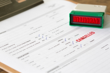 cancelled letter rubber stamp  on application formの写真素材