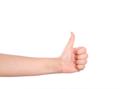 Woman hands thumbs up Isolated on white backgroundの写真素材