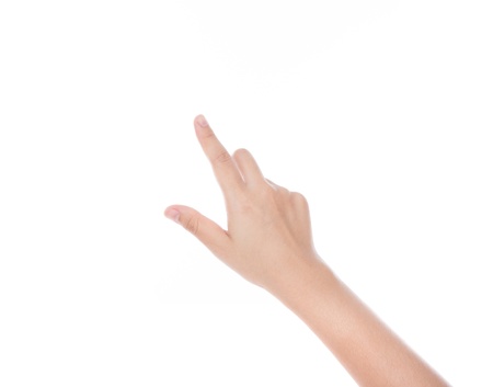 Woman hand touching virtual screen isolated on white backgroundの写真素材