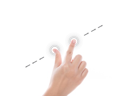 Women hand use  multi-touch gestures for tablets or touch screen deviceの写真素材