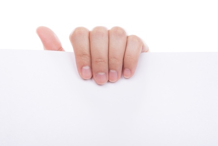 Woman hand holding white empty paper isolated on white backgroundの写真素材