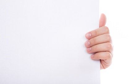 Woman hand holding white empty paper isolated on white backgroundの写真素材