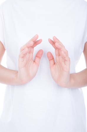 Empty woman hands over body isolated on background.の写真素材