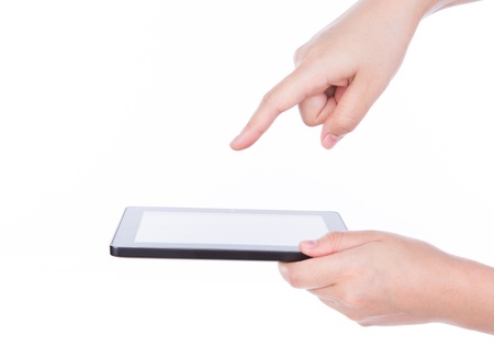 Woman hand using a touch screen device against white backgroundの写真素材