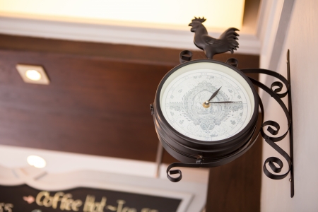 Old style hanging clockの写真素材