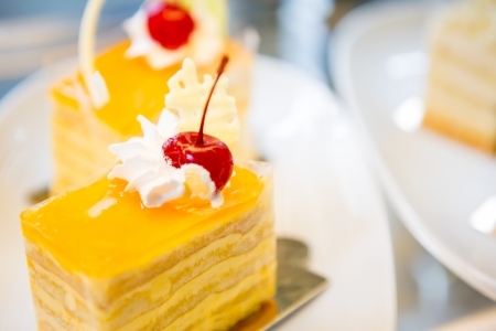 Slice of delicious  cake with fresh berryの写真素材