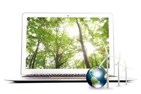 Laptop with tree , wind turbine and earth (Elements of this image furnished by NASA)の写真素材