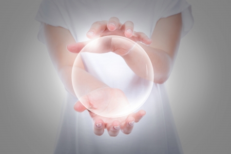 Woman hands hold empty bubble  over bodyの写真素材
