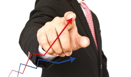 Businessman hand write graph isolated on whiteの写真素材