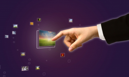 Business Hand touches the flow of imagesの写真素材