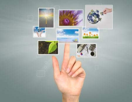Hand touches the flow of imageの写真素材