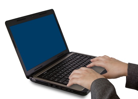 Female hands writing on laptopの写真素材