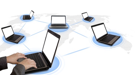 Several laptop computers connected in a social networkの写真素材