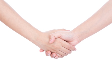Closeup picture of woman shaking hands isolated on white background.の写真素材